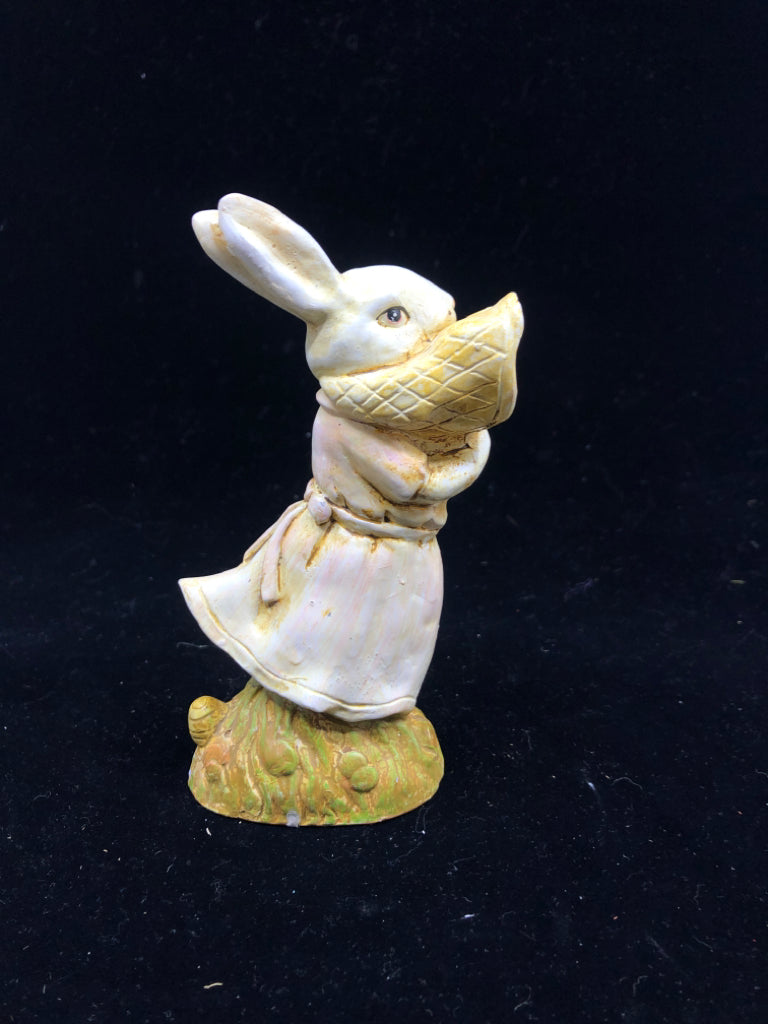 BUNNY HOLDING NET FIGURINE.
