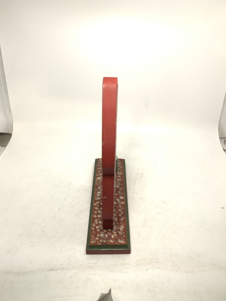 VTG PAINTED WOOD SANTA W/ A TAPERED CANDLE SLOT NEXT TO HIM.