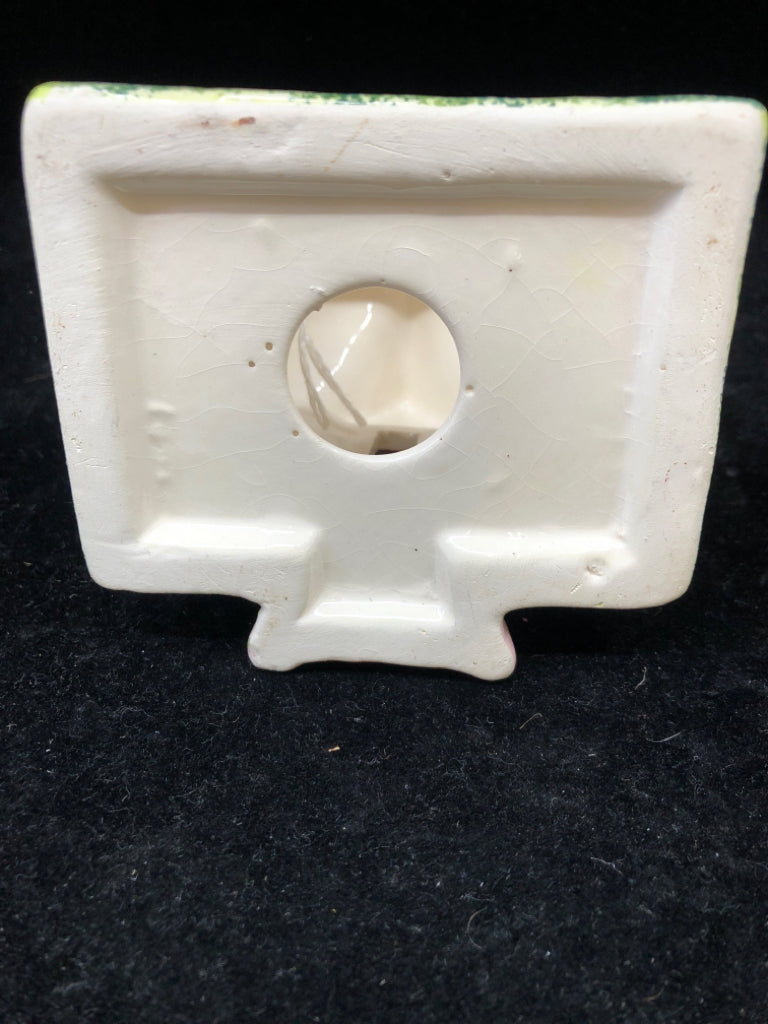 CERAMIC HOUSE TEALIGHT HOLDER.