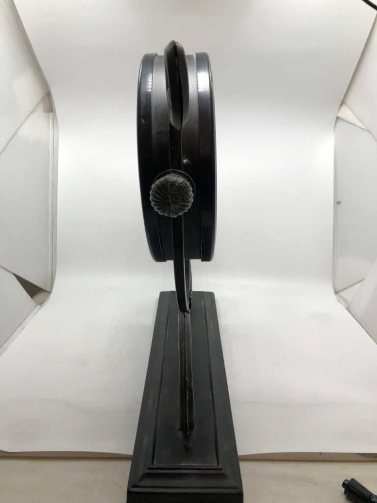 BRUSHED METAL SCROLL SHELF CLOCK.