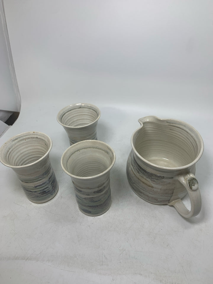 4 PC MULTI COLORED STRIPED POTTERY CUPS W/ PITCHER.