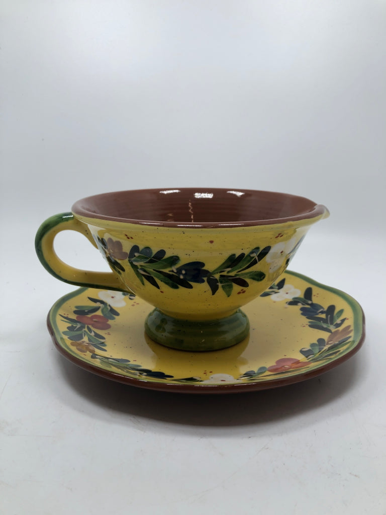 FLORAL PAINTED FOOTED BOWL W/HANDLE ON DRIP PLATE.