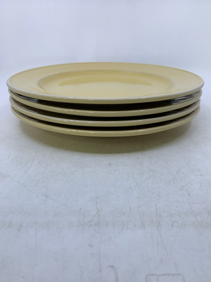 4 PALE YELLOW DINNER PLATES.