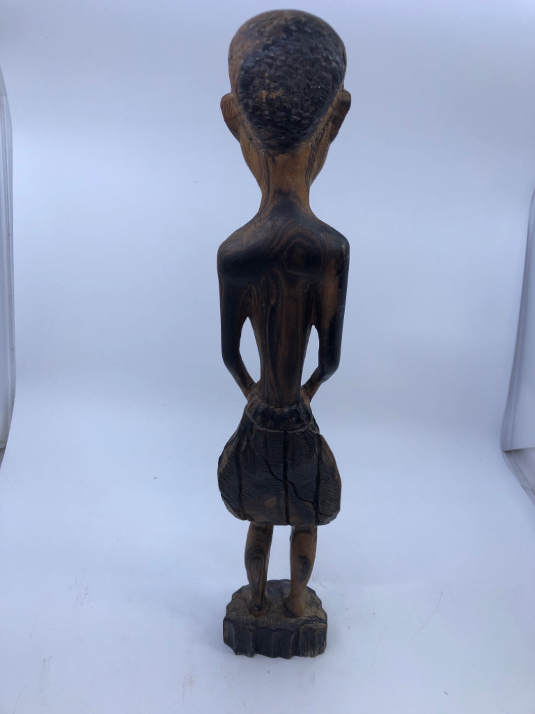 WOOD CARVED CHILD STANDING.