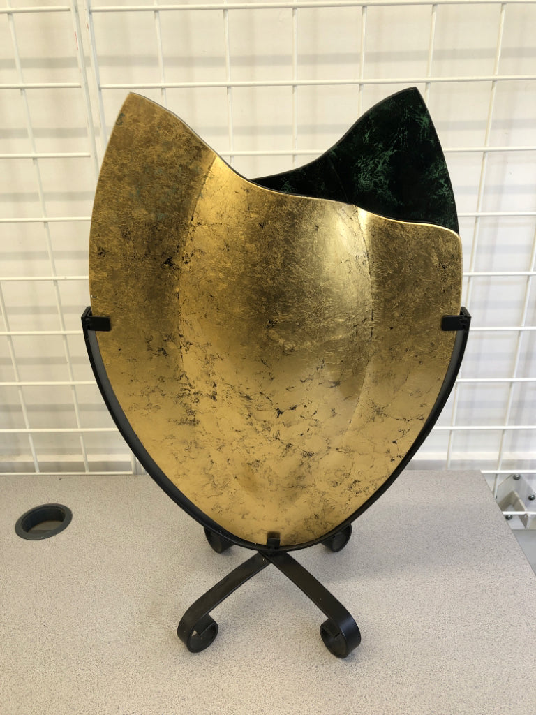ABSTRACT JASMINE/TEXTURED GOLD GLASS VASE ON BLACK METAL STAND.