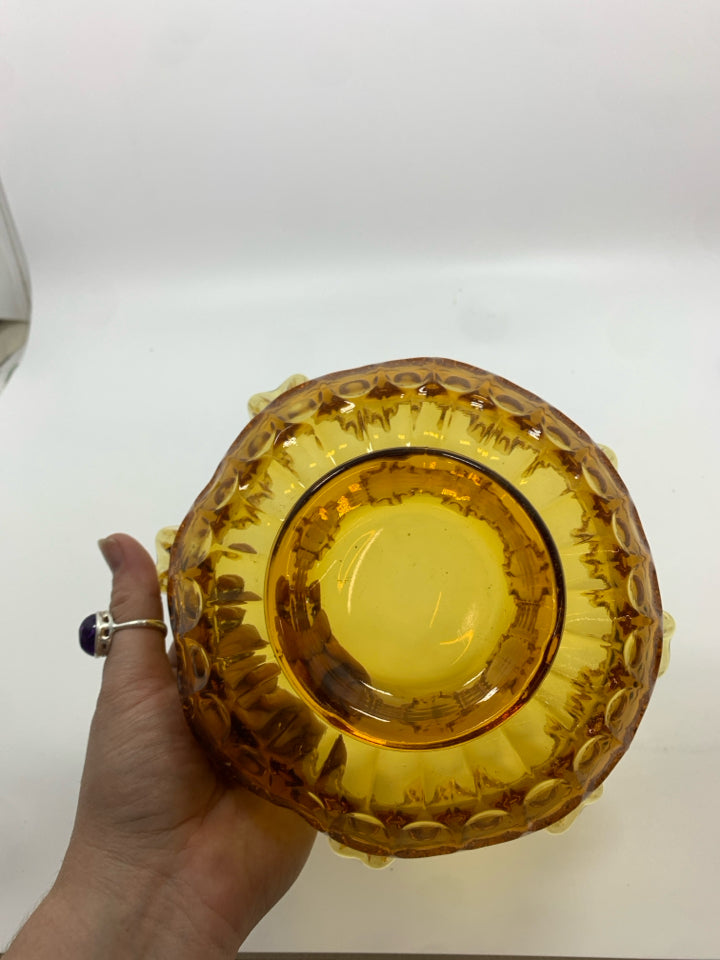 VTG AMBER GLASS THUMBPRINT BOWL W/ RUFFLED EDGE.