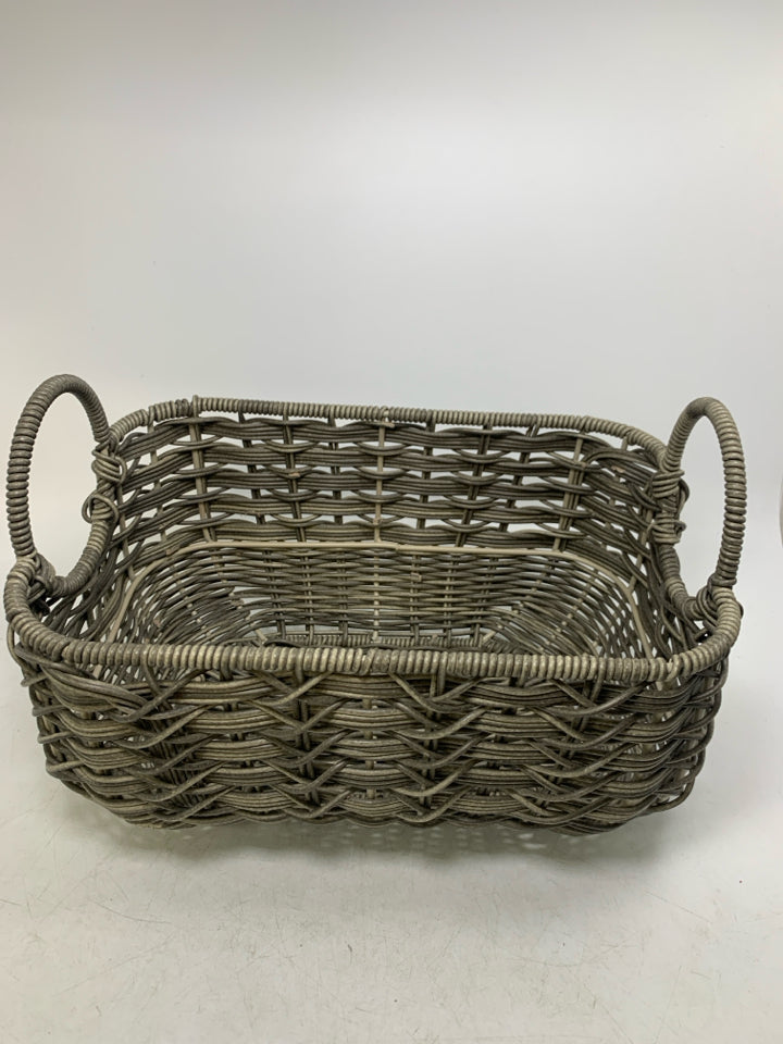STURDY WOVEN ROUNDED BOTTOM GREY BASKET W/ CIRCLE HANDLES.