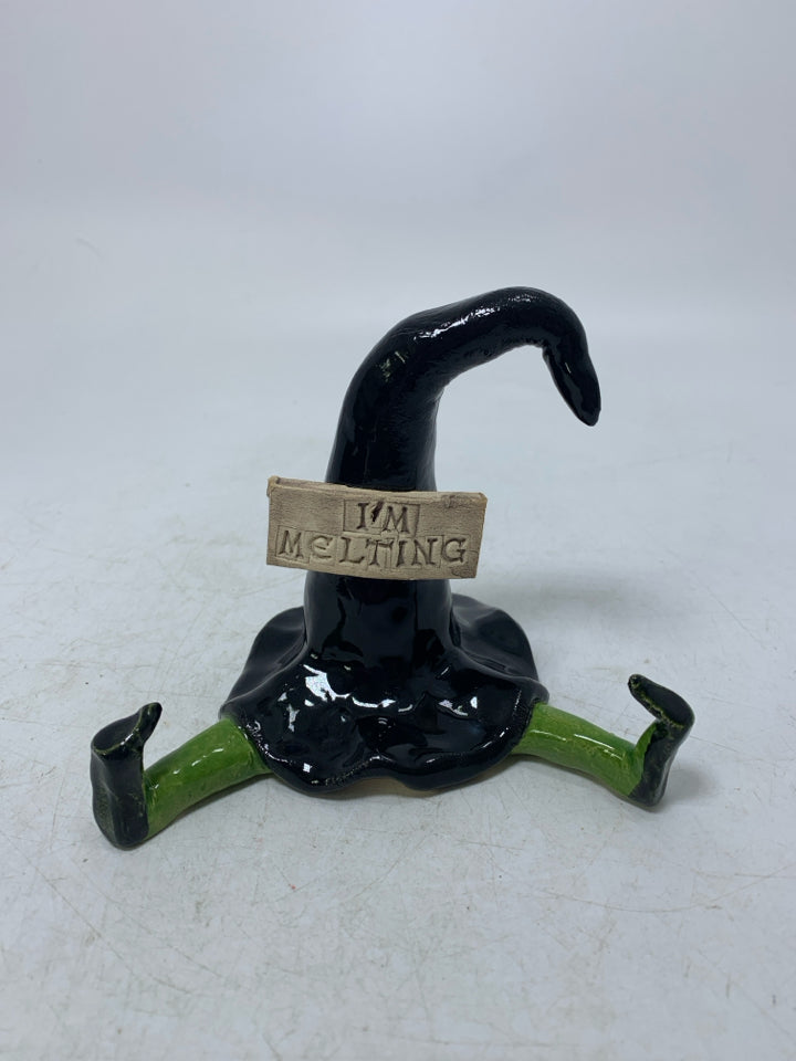 POTTERY WITCH HAT W/ GREEN LEGS IM MELTING FIGURE.