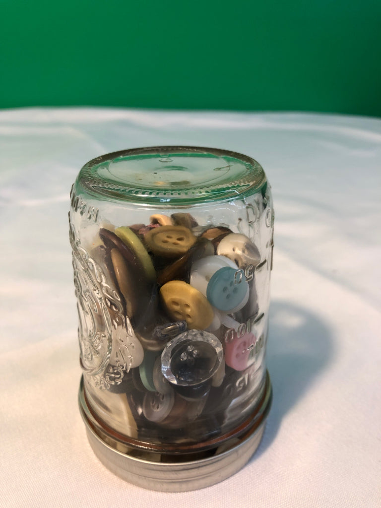 SMALL BALL JAR FILLED W/ BUTTONS.