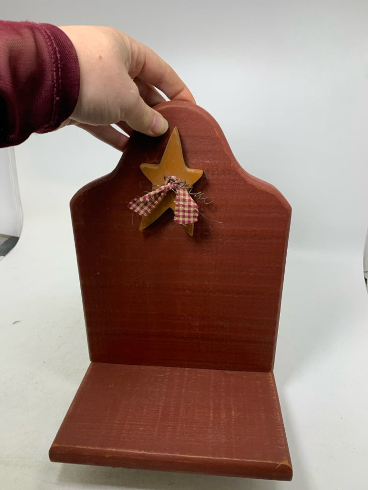 WOOD SHELF W/ EMBOSSED STAR.