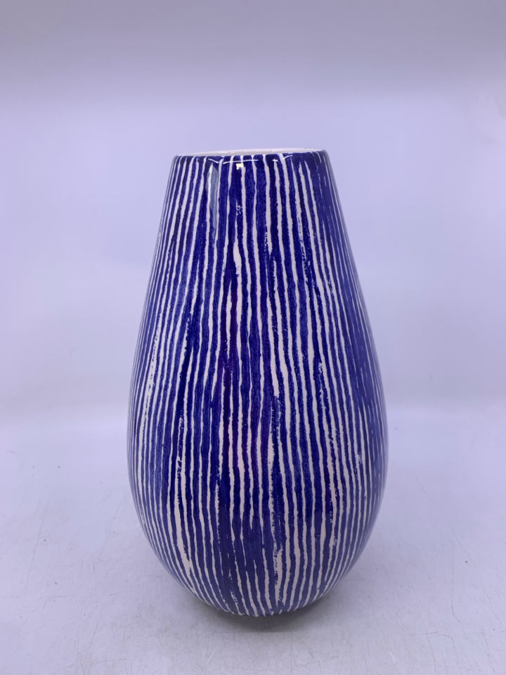 WHITE CERAMIC VASE W/ BLUE STRIPES.