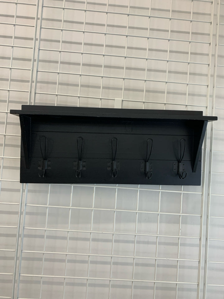 BLACK WALL SHELF W/ 5 HOOKS.