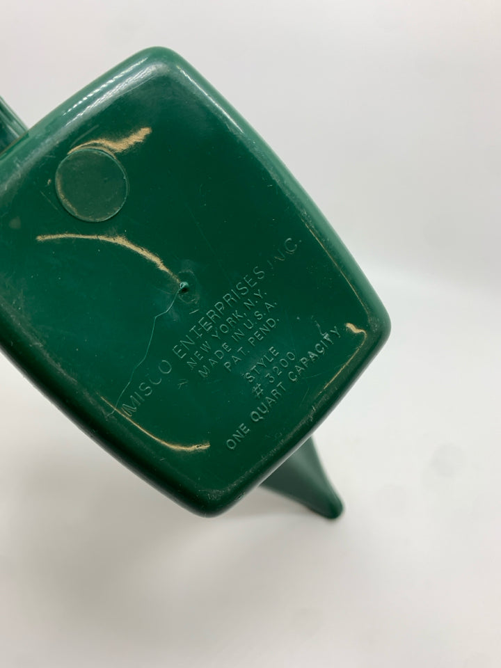 GREEN PLASTIC WATERING CAN.