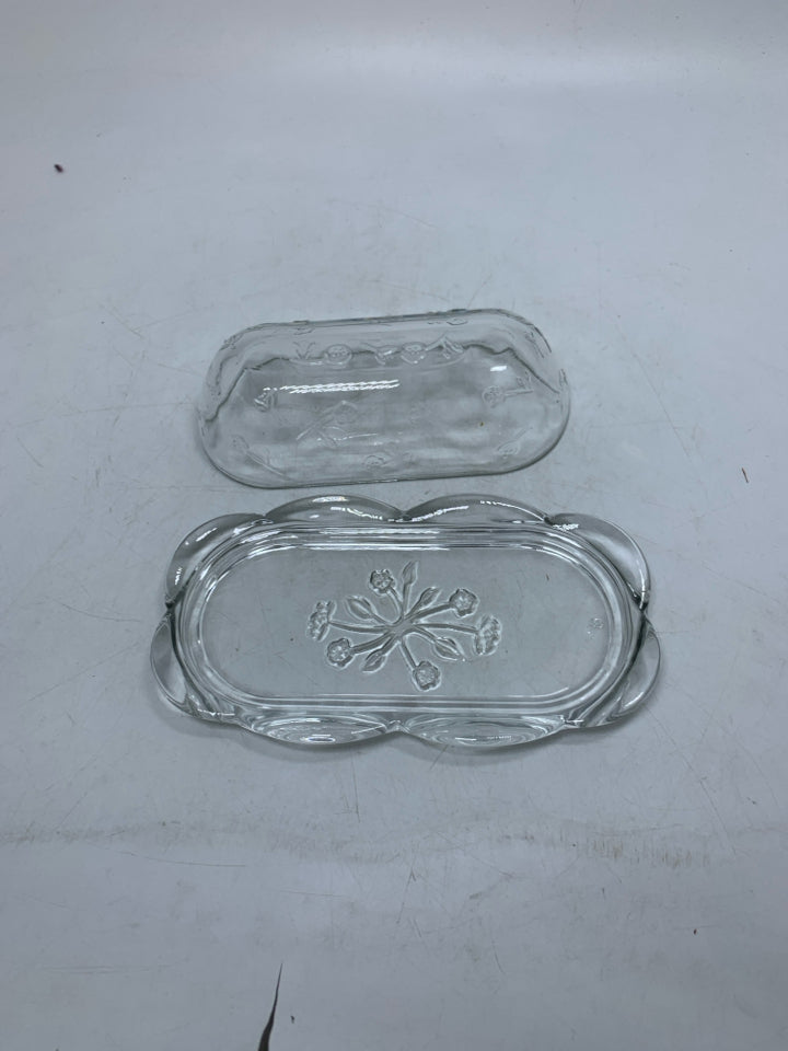 CLEAR GLASS COVERED BUTTER DISH W/ EMBOSSED FLOWERS.