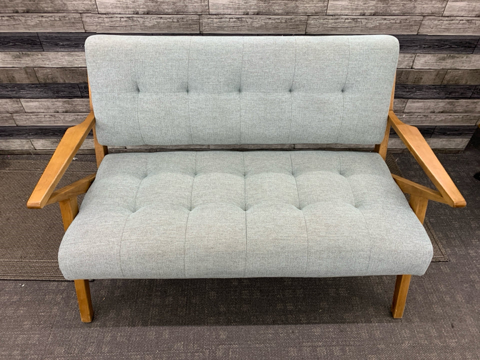 MODERN GRAY LOVE SEAT W/ANGLED ARMS.
