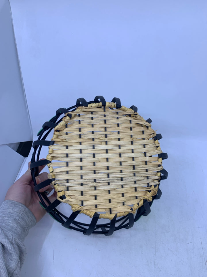 BLACK METAL BASKET W/ GREEN PEARS WOVEN BOTTOM.