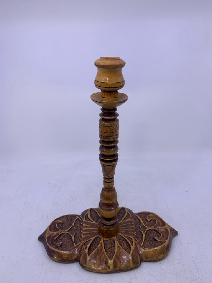 WOOD CARVED TAPERED CANDLE HOLDER.