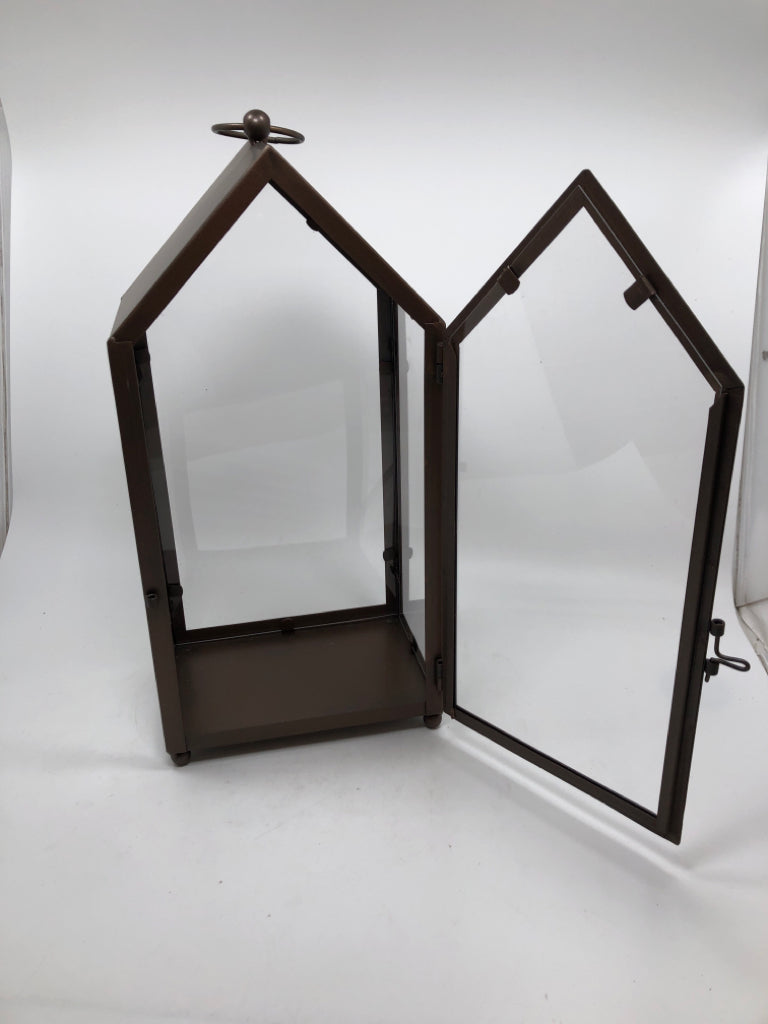 BRONZE PAINTED CANDLE LANTERN.