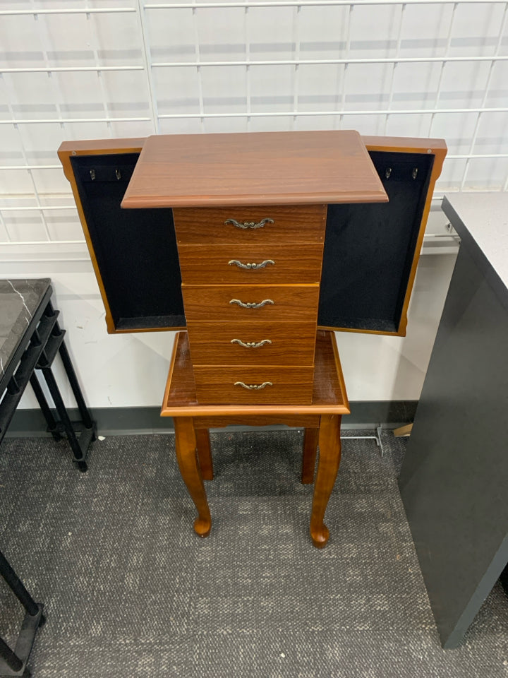 FAUX BROWN WOOD JEWELRY ARMOIRE.