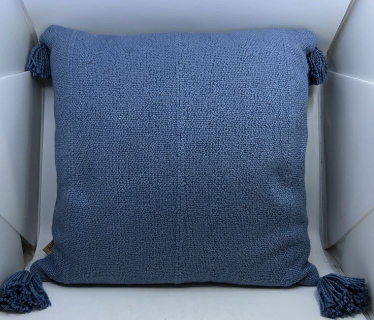 LT BLUE PILLOW W/TASSLES.