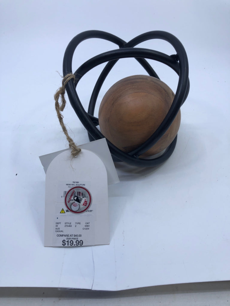 METAL AND WOOD BALL DESK DECOR.