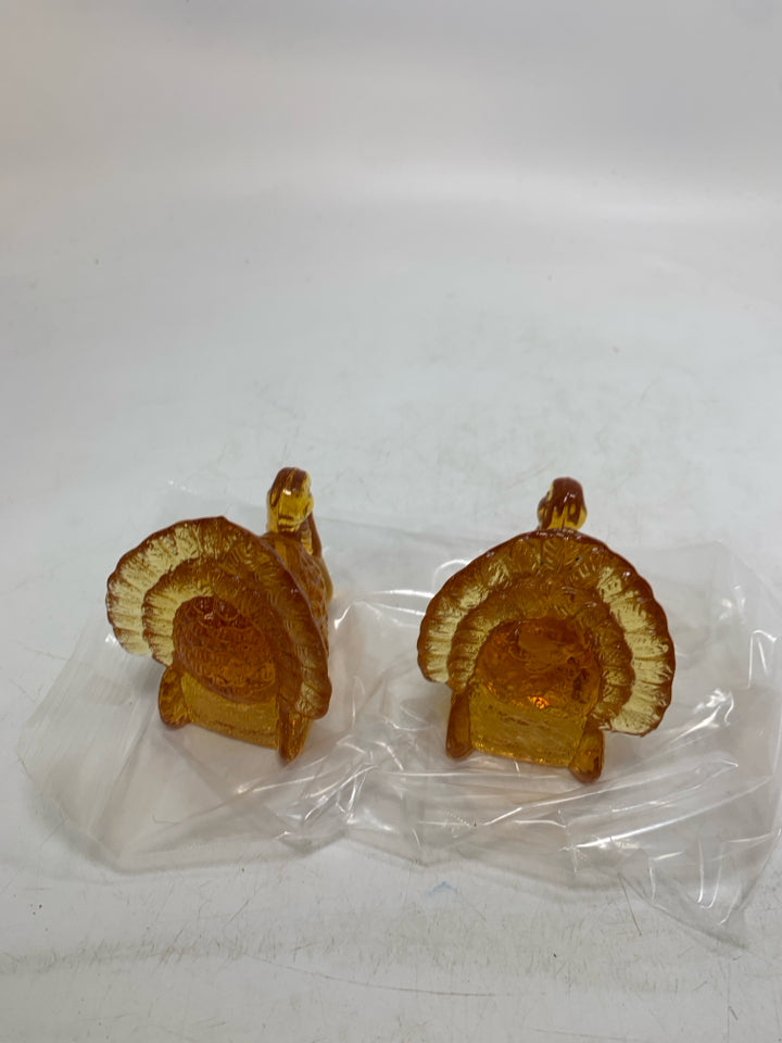 2 EMBER GLASS TAPERED CANDLE HOLDERS IN BAG.
