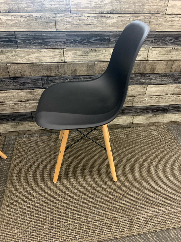 2 DARK GREY PLASTIC CHAIRS W/ WOOD LEGS.