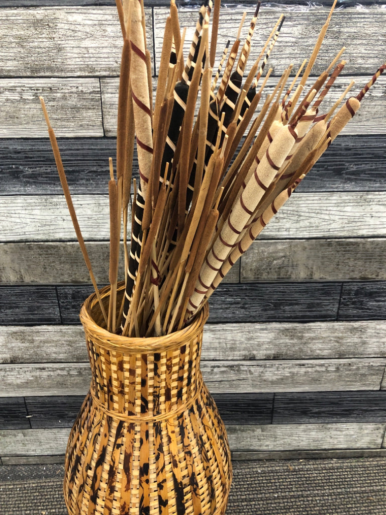 FAUX CAT TAILS IN WOVEN BASKET FLOOR VASE.