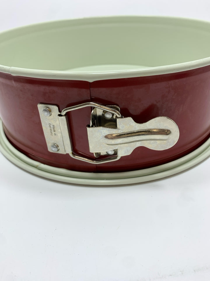 RED NORDIC WARE SPRING-FORM CAKE PAN.