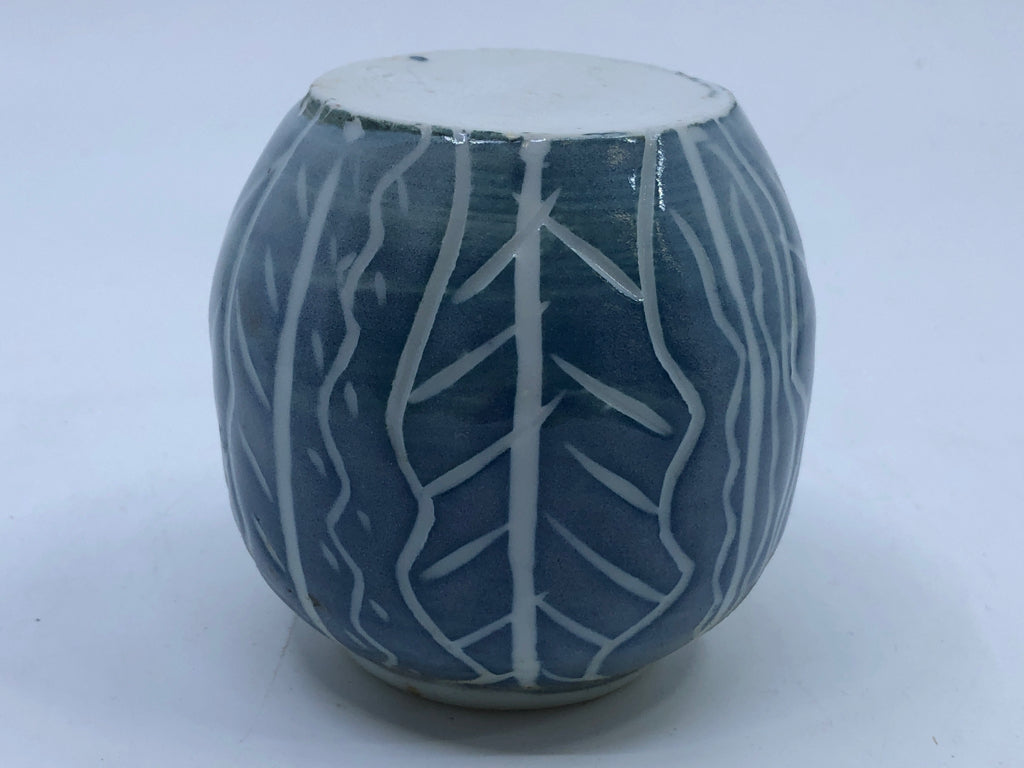 PALE BLUE POTTERY VASE W/ WHITE DETAILS.