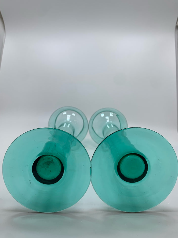2 GLASS FLOATING CANDLESTICKS.