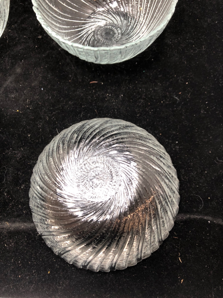 4 CLEAR GLASS SWIRL BOWLS.