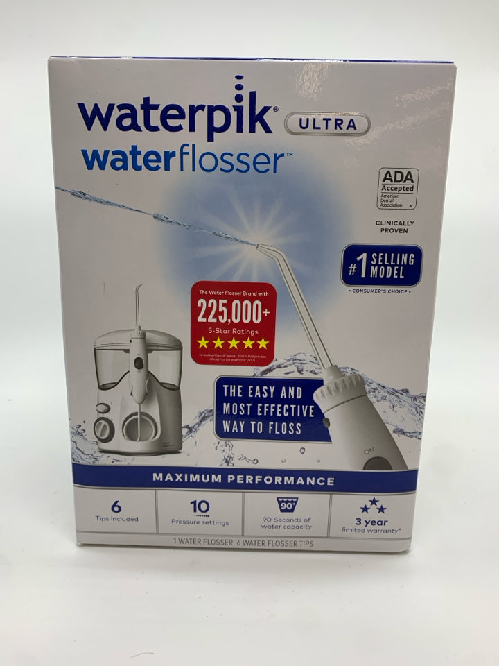 NIB WATERPIK WATER FLOSSER.
