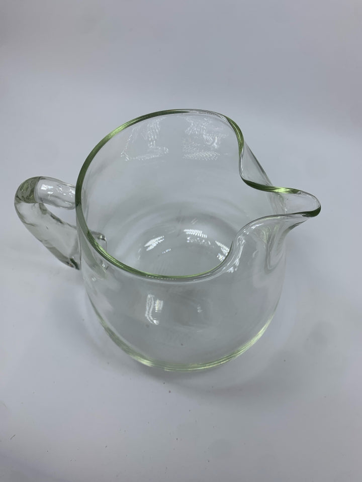 CLEAR GLASS PITCHER W/PINCHED SPOUT.