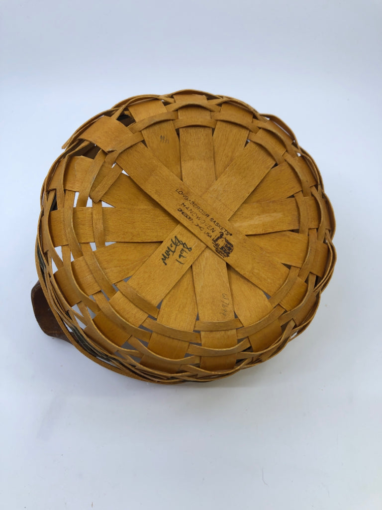 1998 SMALL ROUND BASKET W GREEN ACCENT AND LEATHER HANDLES.