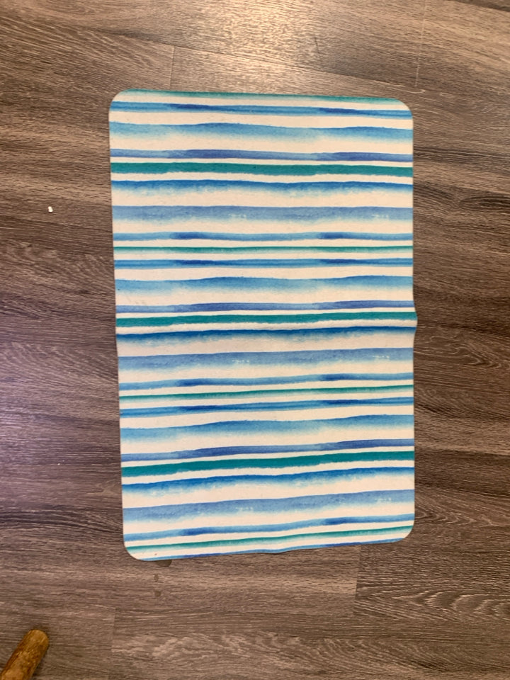 BLUE/GREEN STRIPPED SKID RESISTANT ACCENT RUG.
