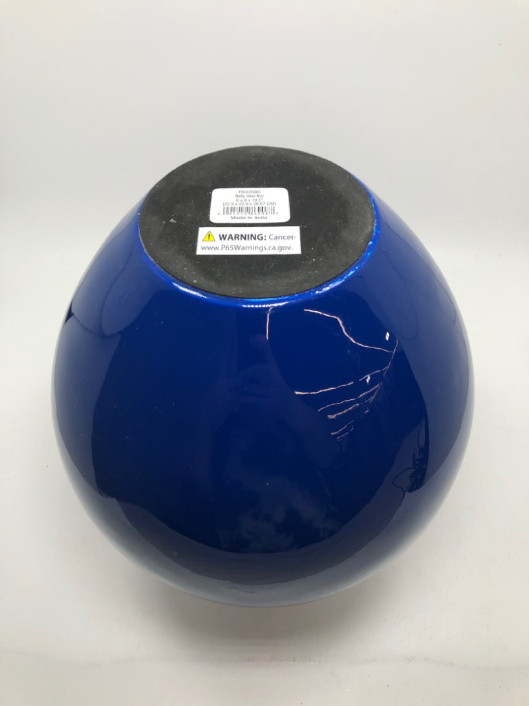 ROUND BLUE CERAMIC VASE.