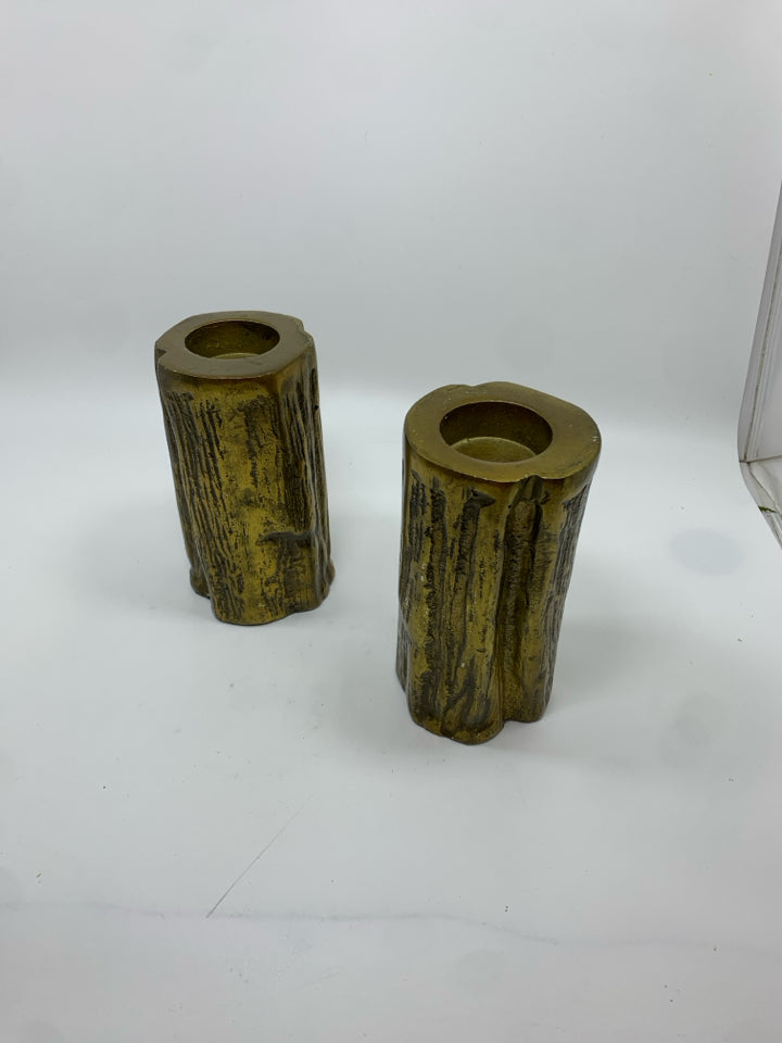 2 GOLDEN METAL TREE STUMP VOTIVE HOLDERS.