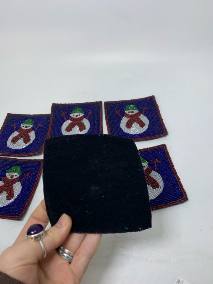 6 DARK BLUE BEADED SNOWMEN COASTERS.