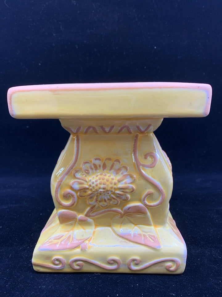YELLOW, PINK, WHITE FLORAL DESIGN CANDLE PEDESTAL.