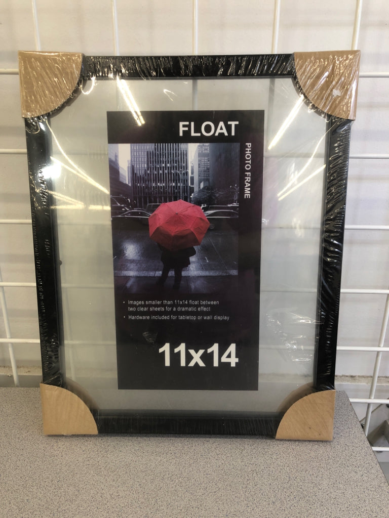 NIP BLACK FLOATING FRAME.