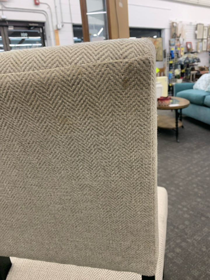 2 CREAM ACCENT CHAIRS W/ BLACK LEGS.