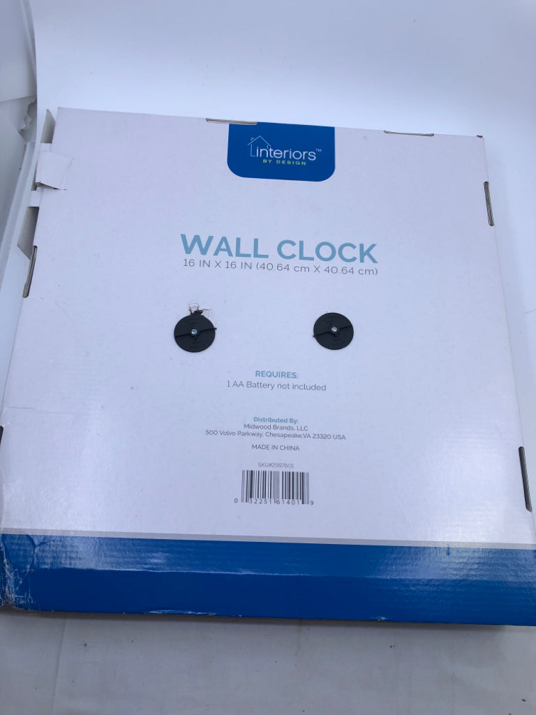 NIB BLACK WALL CLOCK.