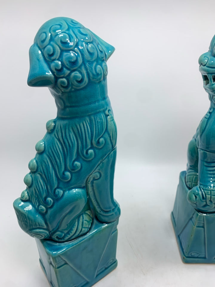 2 BLUE GLAZED FOO DOG STATUES.
