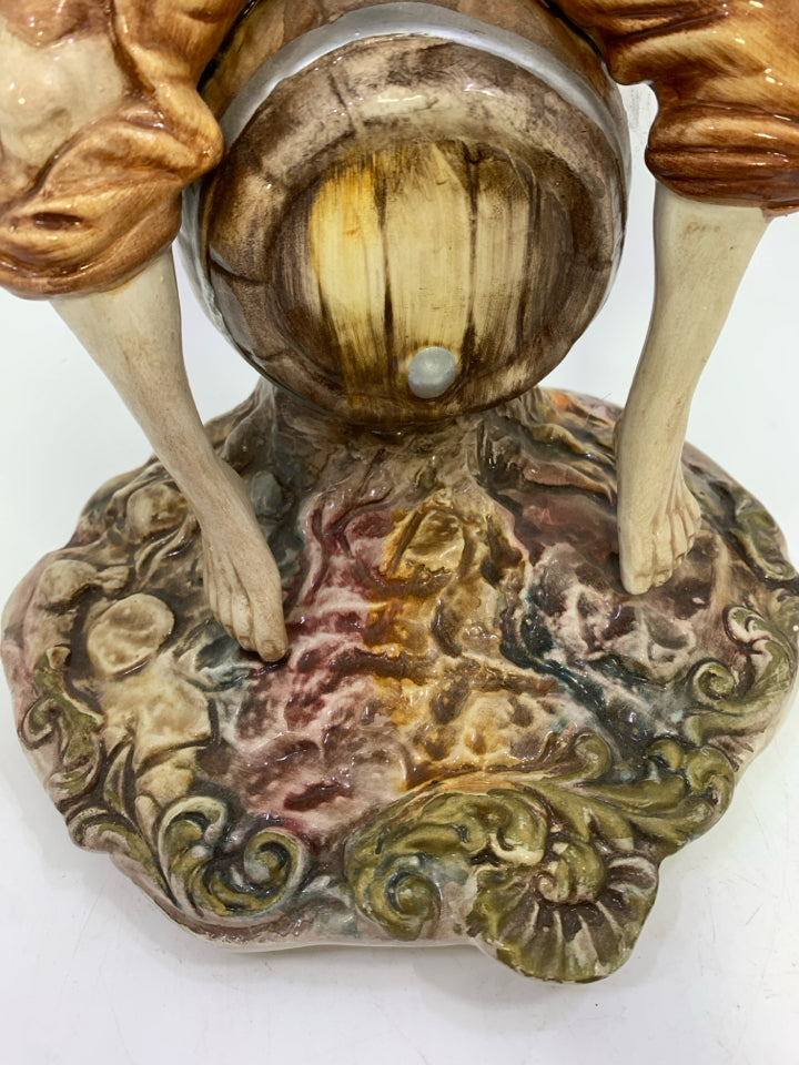 VTG CAPODIMONTE PORCELAIN MAN SITTING ON BARREL FIGURINE.
