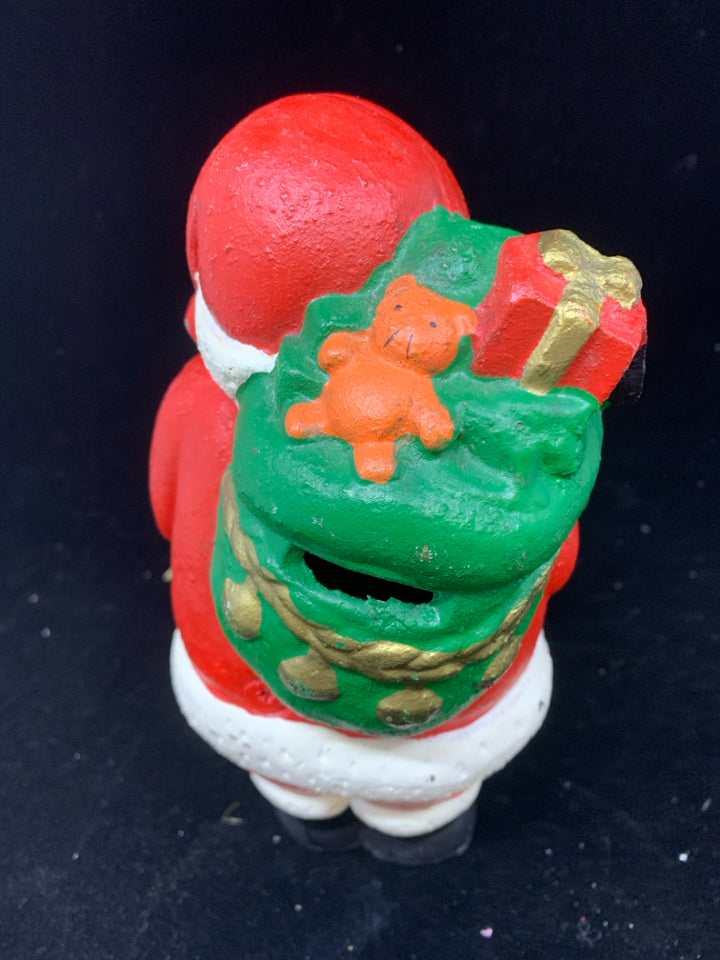 CAST IRON SANTA W/TOY BAG STILL BANK.