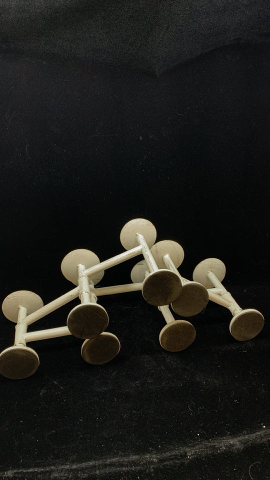 7 SECTION FOLDING WHITE METAL DISTRESSED TAPER HOLDER.