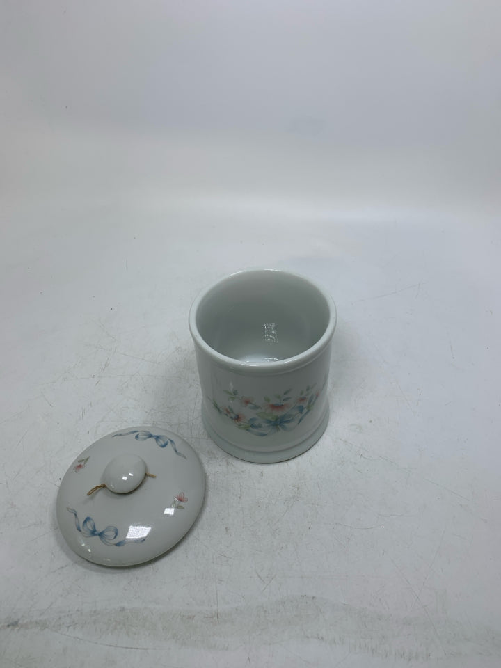 SMALL PORCELAIN CANISTER W/ PAINTED FLOWERS/BOWS.