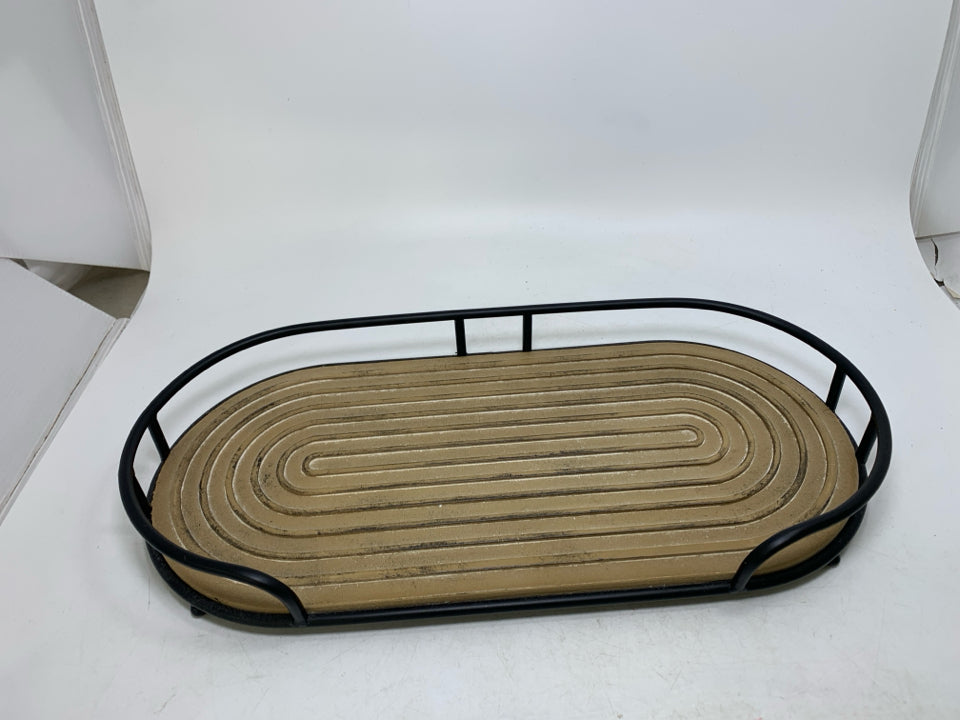 OVAL WOOD TEXTURED BASED W/ BLACK METAL BOARDER.