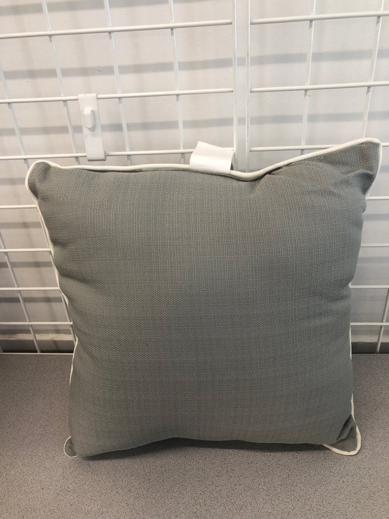 GRAY PILLOW W/WHITE TRIM.